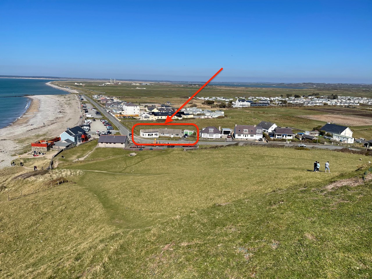 View from the Iron Age hillfort to the south, with Min Y Mor circled — showing direct beach frontage on Dinas Dinlle